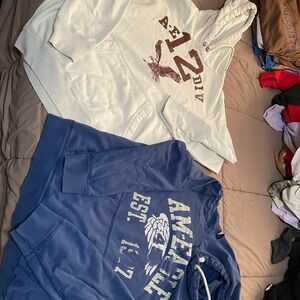 American Eagle Outfitters Cream & Blue Pullover Hoodies with Graphic Logos
